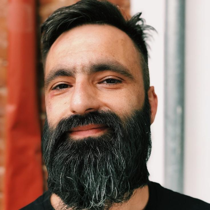 Leo Chen, Client Relations Director, discussing corporate gifting strategy with business clients